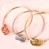 Bangle Bracelet with Heart Shape Pendants in Sterling Silver