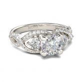 Jeulia Twist Three Stone Round Cut Sterling Silver Ring