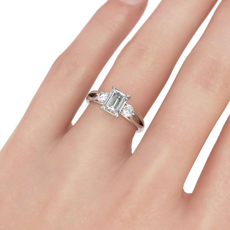 three stone emerald cut ring